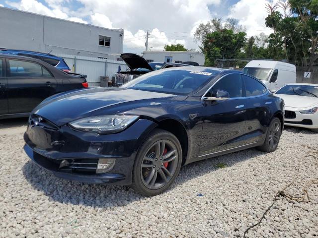 TESLA MODEL S 2014 с VIN 5YJSA1H13EFP40997 - Снимка от търг