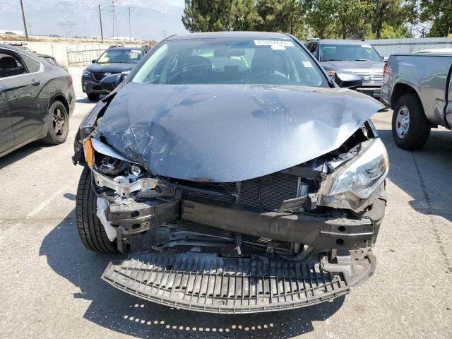 Photo 5 from auction – 2014 TOYOTA COROLLA L with VIN 5YFBURHE2EP128075