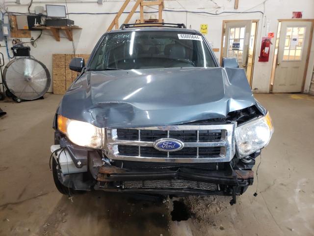 Photo 5 from auction – 2011 FORD ESCAPE LIM with VIN 1FMCU0E74BKC04679