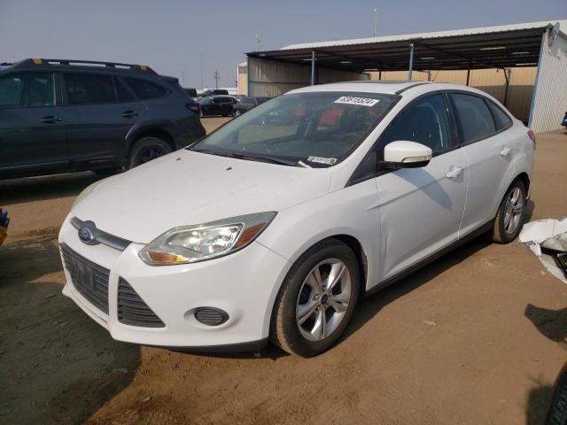 FORD FOCUS SE 2014 with VIN 1FADP3F22EL320049 - Photo from auction