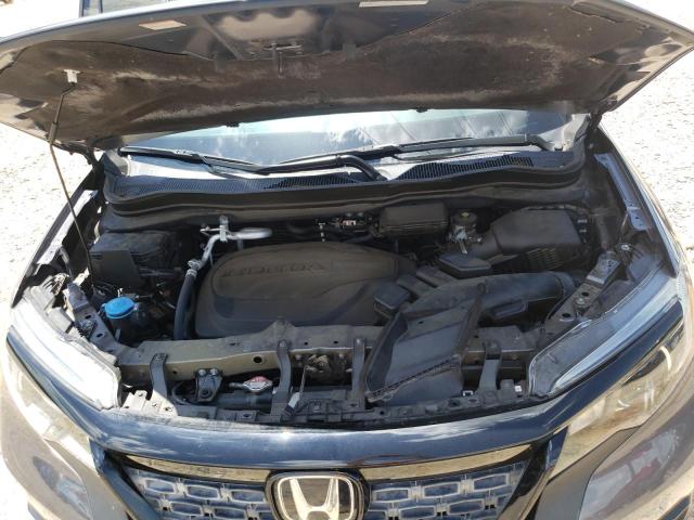 Photo 11 from auction – 2021 HONDA PASSPORT E with VIN 5FNYF8H57MB000634