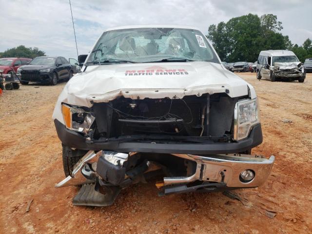 Photo 5 from auction – 2011 FORD F150 with VIN 1FTMF1EM7BFB78165