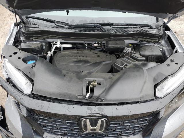 Photo 12 from auction – 2021 HONDA PASSPORT E with VIN 5FNYF7H56MB015006