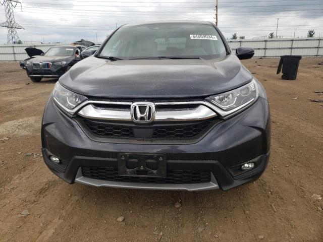 Photo 5 from auction – 2018 HONDA CR-V EX with VIN 7FARW2H57JE084634