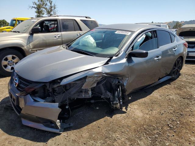 NISSAN ALTIMA 2.5 2018 with VIN 1N4AL3AP0JC256072 - Photo from auction