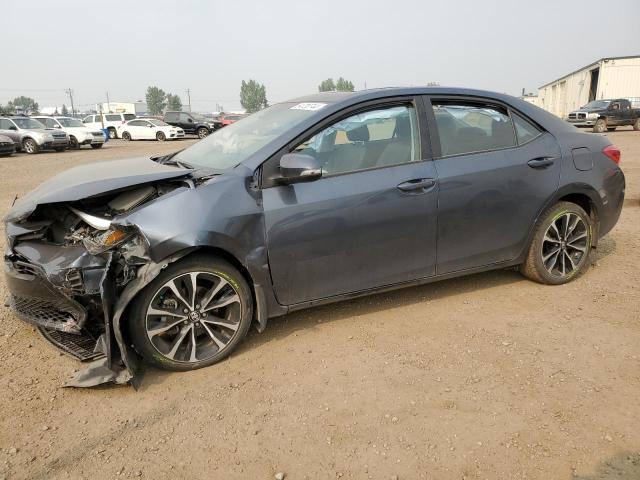 TOYOTA COROLLA L 2019 with VIN 2T1BURHE2KC208732 - Photo from auction