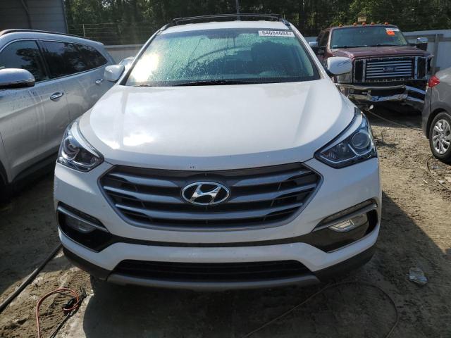 Photo 5 from auction – 2017 HYUNDAI SANTA FE S with VIN 5NMZU3LB0HH047941