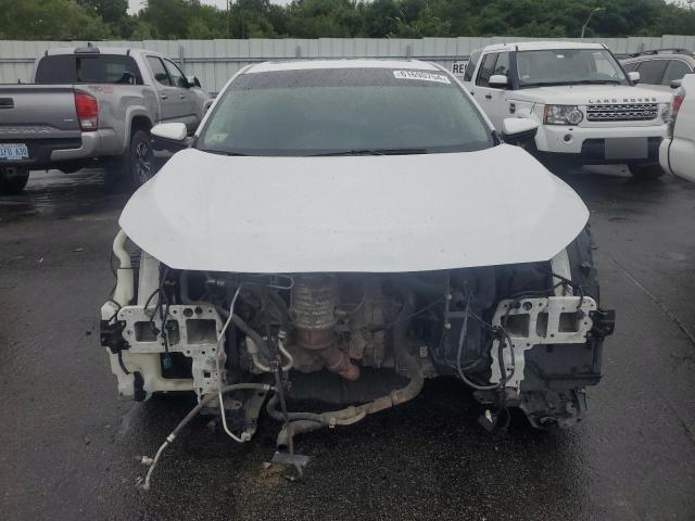 Photo 5 from auction – 2018 HONDA CIVIC EX with VIN 2HGFC2F75JH529668