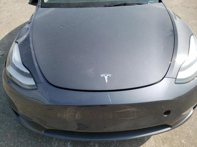 Photo 11 from auction – 2022 TESLA MODEL Y with VIN 7SAYGDEE9NF362415