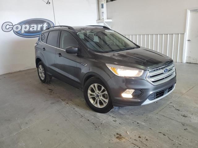 Photo 4 from auction – 2018 FORD ESCAPE SE with VIN 1FMCU0GD3JUC11614