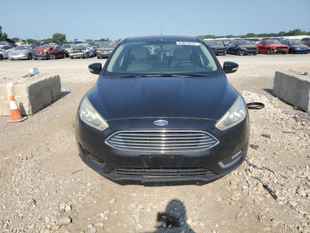 Photo 5 from auction – 2015 FORD FOCUS TITA with VIN 1FADP3N23FL349353