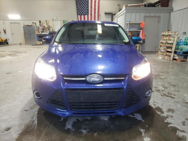 Foto 5 de la subasta – 2014 FORD FOCUS SE con VIN 1FADP3F28EL147427