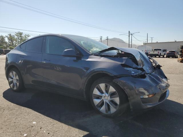 Photo 4 from auction – 2023 TESLA MODEL Y with VIN 7SAYGAEE4PF899677