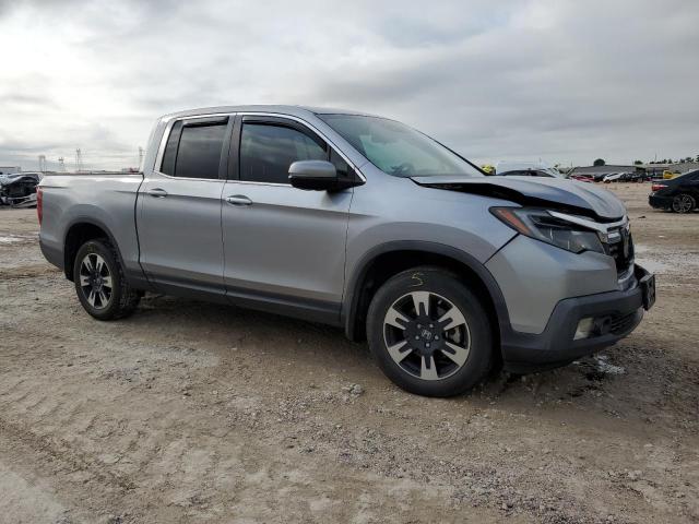 Photo 4 from auction – 2020 HONDA RIDGELINE with VIN 5FPYK3F52LB012942