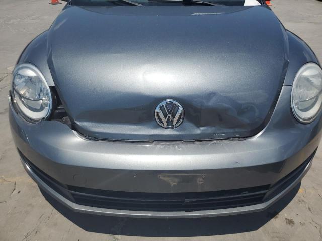 Photo 11 from auction – 2013 VOLKSWAGEN BEETLE with VIN 3VW5P7AT7DM828632
