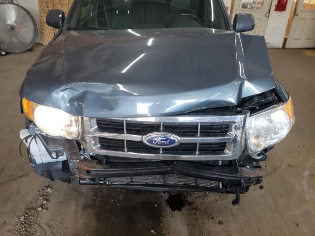 Photo 12 from auction – 2011 FORD ESCAPE LIM with VIN 1FMCU0E74BKC04679