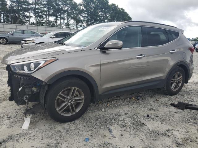 HYUNDAI SANTA FE S 2017 with VIN 5NMZU3LB4HH036389 - Photo from auction