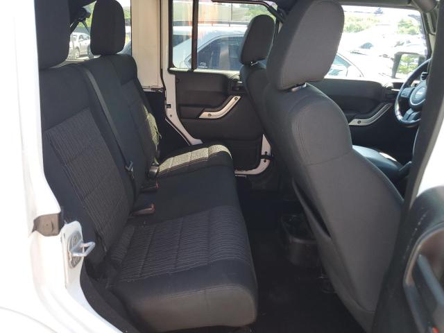 Photo 11 from auction – 2012 JEEP WRANGLER U with VIN 1C4BJWEG8CL100655
