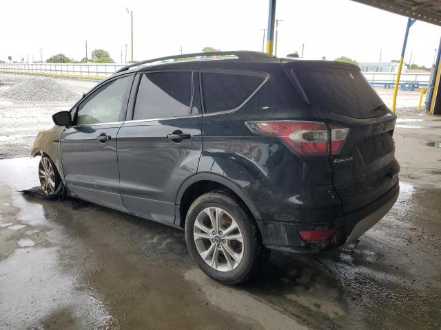 Photo 2 from auction – 2018 FORD ESCAPE SE with VIN 1FMCU9GD5JUA35279