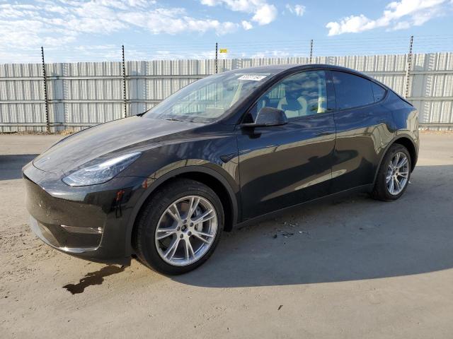 TESLA MODEL Y 2024 with VIN 7SAYGDEE7RF007992 - Photo from auction