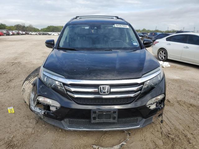 Foto 5 de la subasta – 2017 HONDA PILOT ELIT con VIN 5FNYF6H06HB020176