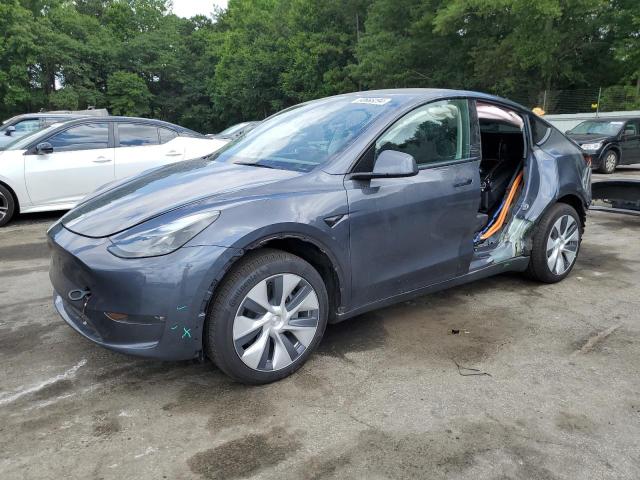 TESLA MODEL Y 2023 with VIN 7SAYGDED6PF935135 - Photo from auction