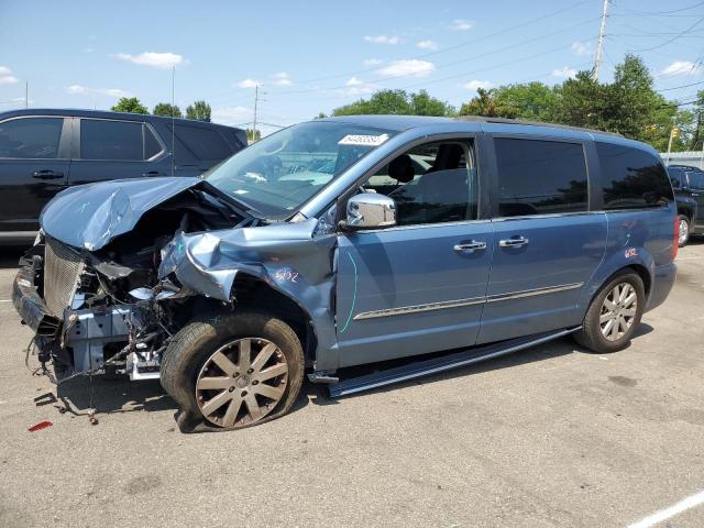 CHRYSLER TOWN & COU 2011 with VIN 2A4RR8DG6BR779829 - Photo from auction