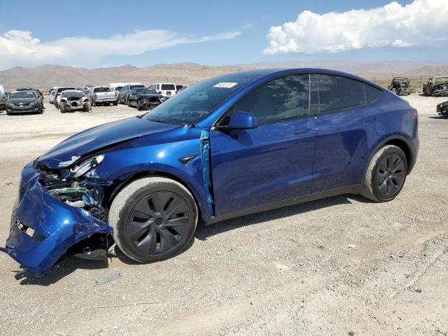 TESLA MODEL Y 2024 with VIN 7SAYGDED5RF107452 - Photo from auction