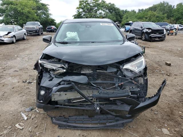 Photo 5 from auction – 2018 TOYOTA RAV4 LE with VIN 2T3BFREV8JW828908