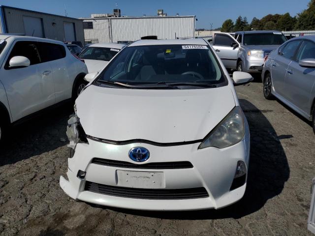 Photo 5 from auction – 2014 TOYOTA PRIUS C with VIN JTDKDTB34E1563687