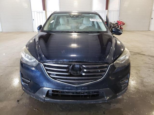 Photo 5 from auction – 2016 MAZDA CX-5 GT with VIN JM3KE2DY1G0707793