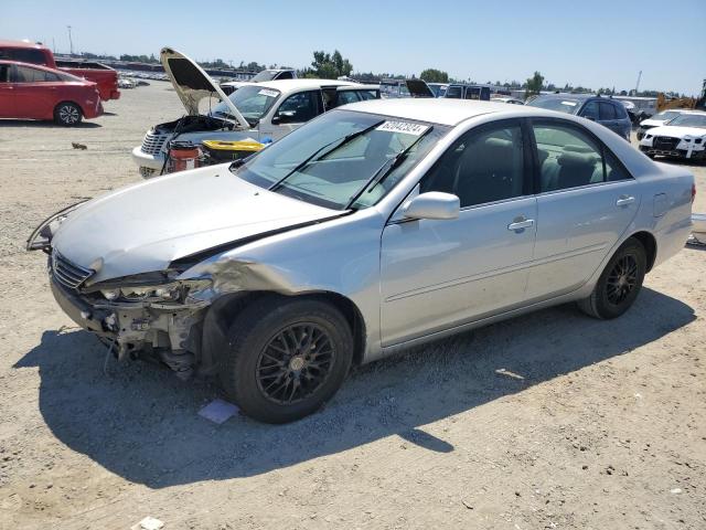 TOYOTA CAMRY LE 2005 with VIN 4T1BF30KX5U099786 - Photo from auction