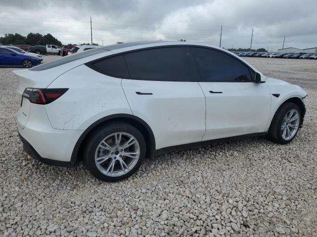 Photo 3 from auction – 2023 TESLA MODEL Y with VIN 7SAYGDEE4PA093692