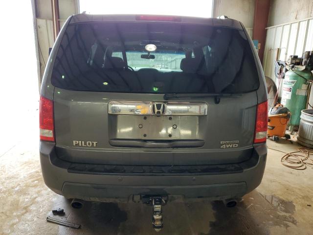 Photo 6 from auction – 2010 HONDA PILOT TOUR with VIN 5FNYF4H98AB033939