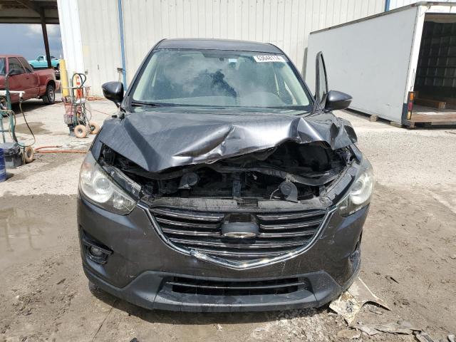 Photo 5 from auction – 2016 MAZDA CX-5 TOURI with VIN JM3KE2CY5G0740197