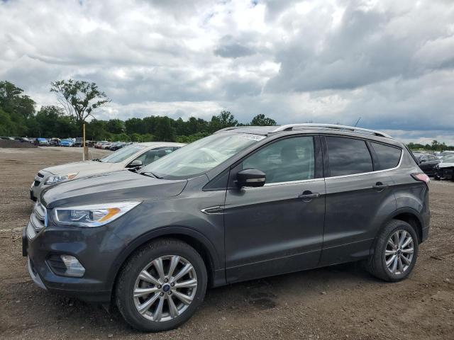 FORD ESCAPE TIT 2018 with VIN 1FMCU0J90JUB48329 - Photo from auction