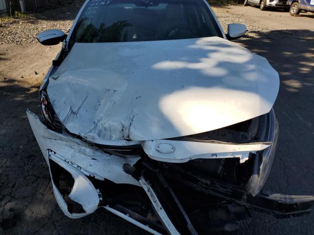Photo 11 from auction – 2015 KIA OPTIMA LX with VIN KNAGM4A71F5658120
