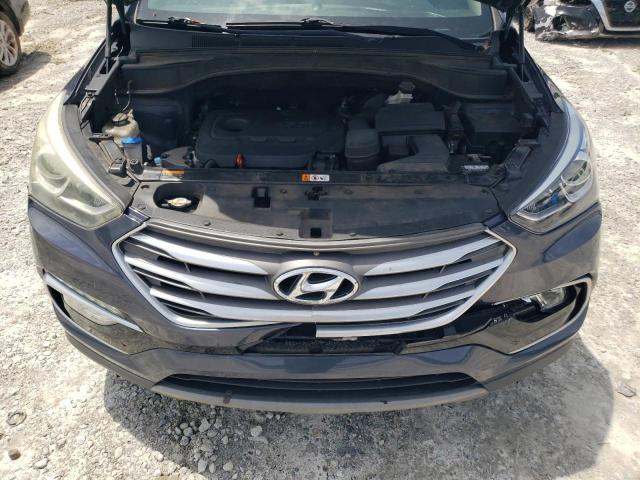 Photo 12 from auction – 2017 HYUNDAI SANTA FE S with VIN 5NMZU3LB1HH016231