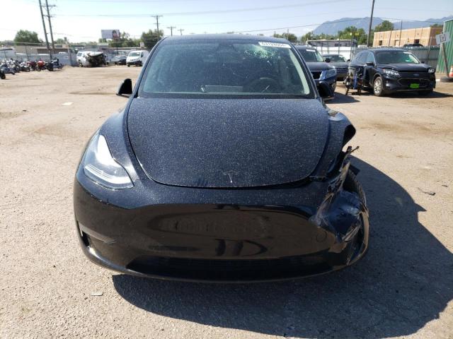 Photo 5 from auction – 2023 TESLA MODEL Y with VIN 7SAYGDEE9PF699184