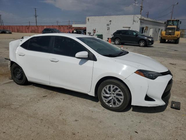 Photo 4 from auction – 2018 TOYOTA COROLLA L with VIN 5YFBURHEXJP804900