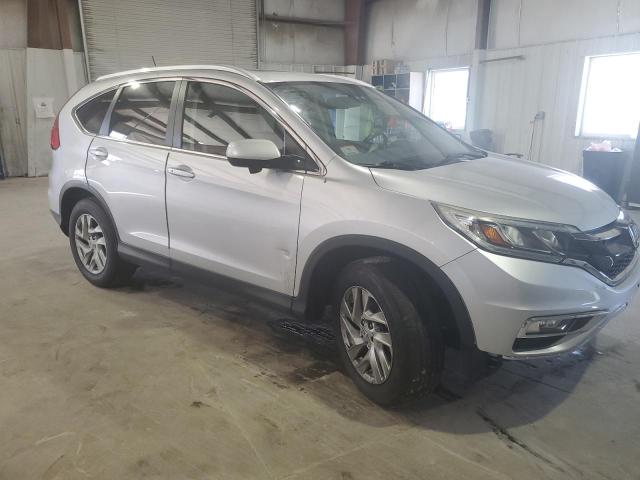 Photo 4 from auction – 2015 HONDA CR-V EXL with VIN 5J6RM4H71FL030548