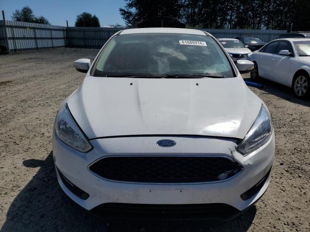 Photo 5 from auction – 2015 FORD FOCUS SE with VIN 1FADP3K29FL275800