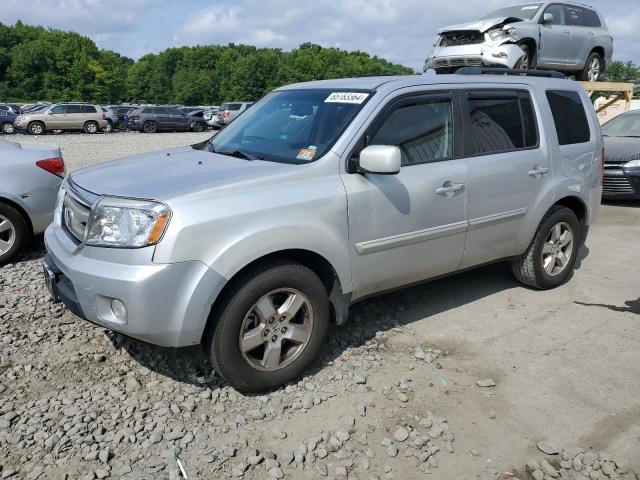 HONDA PILOT EXLN 2011 with VIN 5FNYF4H71BB025438 - Photo from auction
