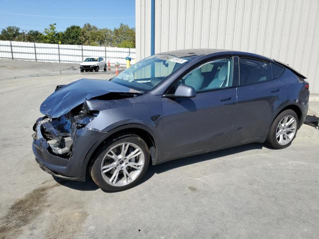 TESLA MODEL Y 2023 with VIN 7SAYGDEE9PF883928 - Photo from auction