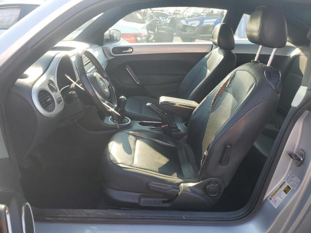 Photo 7 from auction – 2013 VOLKSWAGEN BEETLE with VIN 3VWHP7AT2DM668592