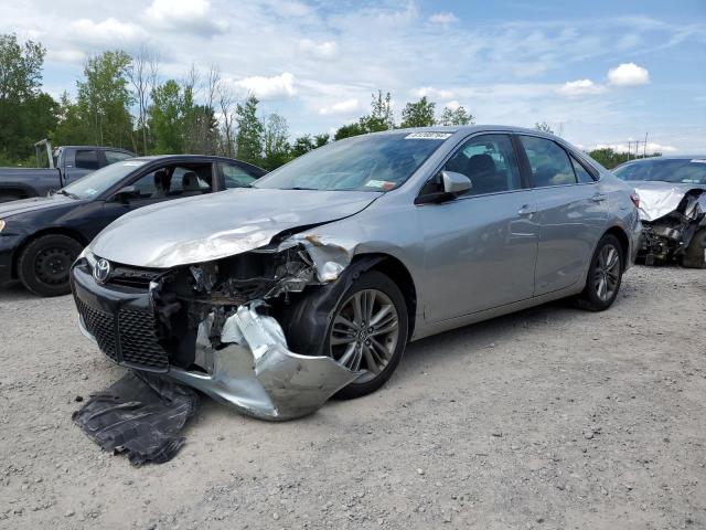 TOYOTA CAMRY LE 2017 with VIN 4T1BF1FK7HU388284 - Photo from auction