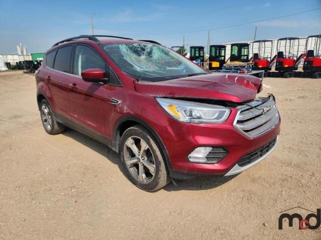 Photo 4 from auction – 2017 FORD ESCAPE SE with VIN 1FMCU9GD1HUD46010