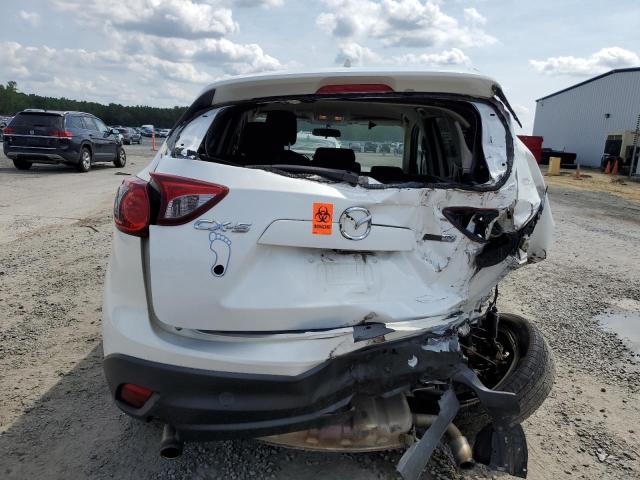 Photo 6 from auction – 2014 MAZDA CX-5 TOURI with VIN JM3KE2CY9E0414111