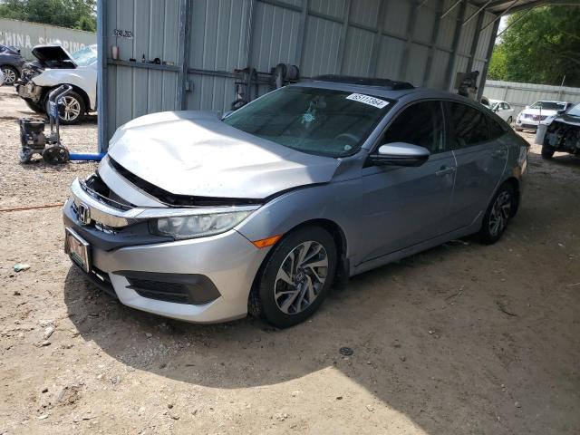 HONDA CIVIC EX 2018 with VIN 19XFC2F70JE015091 - Photo from auction