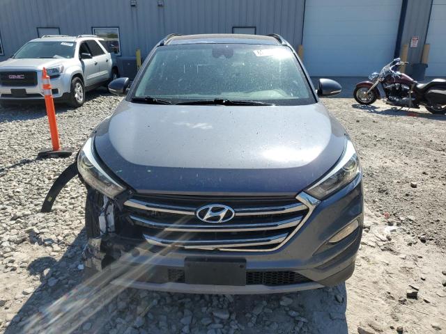 Photo 5 from auction – 2017 HYUNDAI TUCSON LIM with VIN KM8J3CA21HU296319